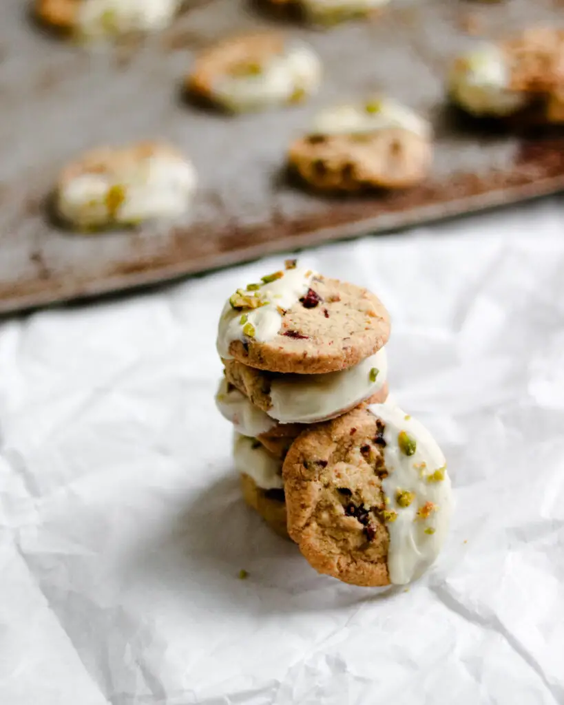 pistachio cranberry shortbread cookies, dipped in white chocolate