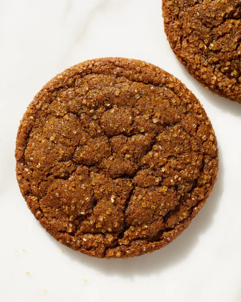 a crinkly ginger molasses cookie with a darker brown color than usual
