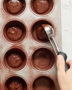 filling muffin tins for mini molten chocolate lava cakes
