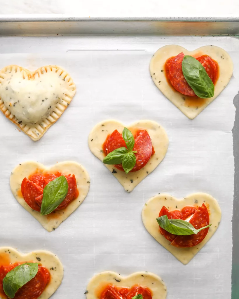 The top and bottom crusts of the hand pie are crimped together with a fork