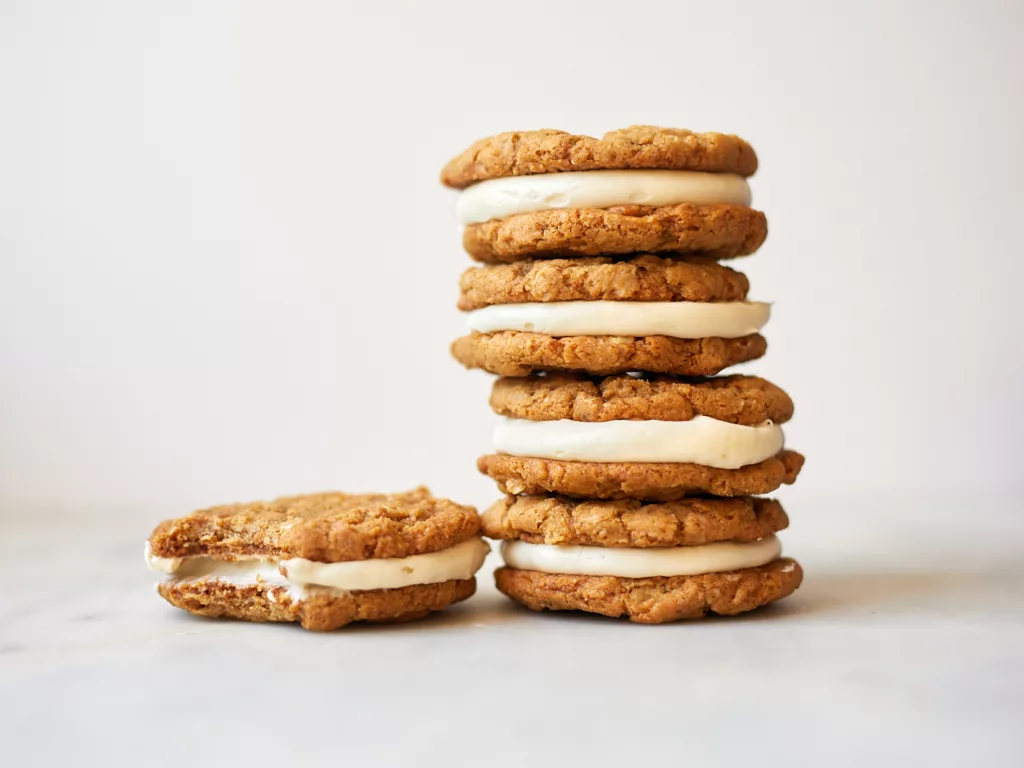 oatmeal cream pies are stacked on top of each other against a white background