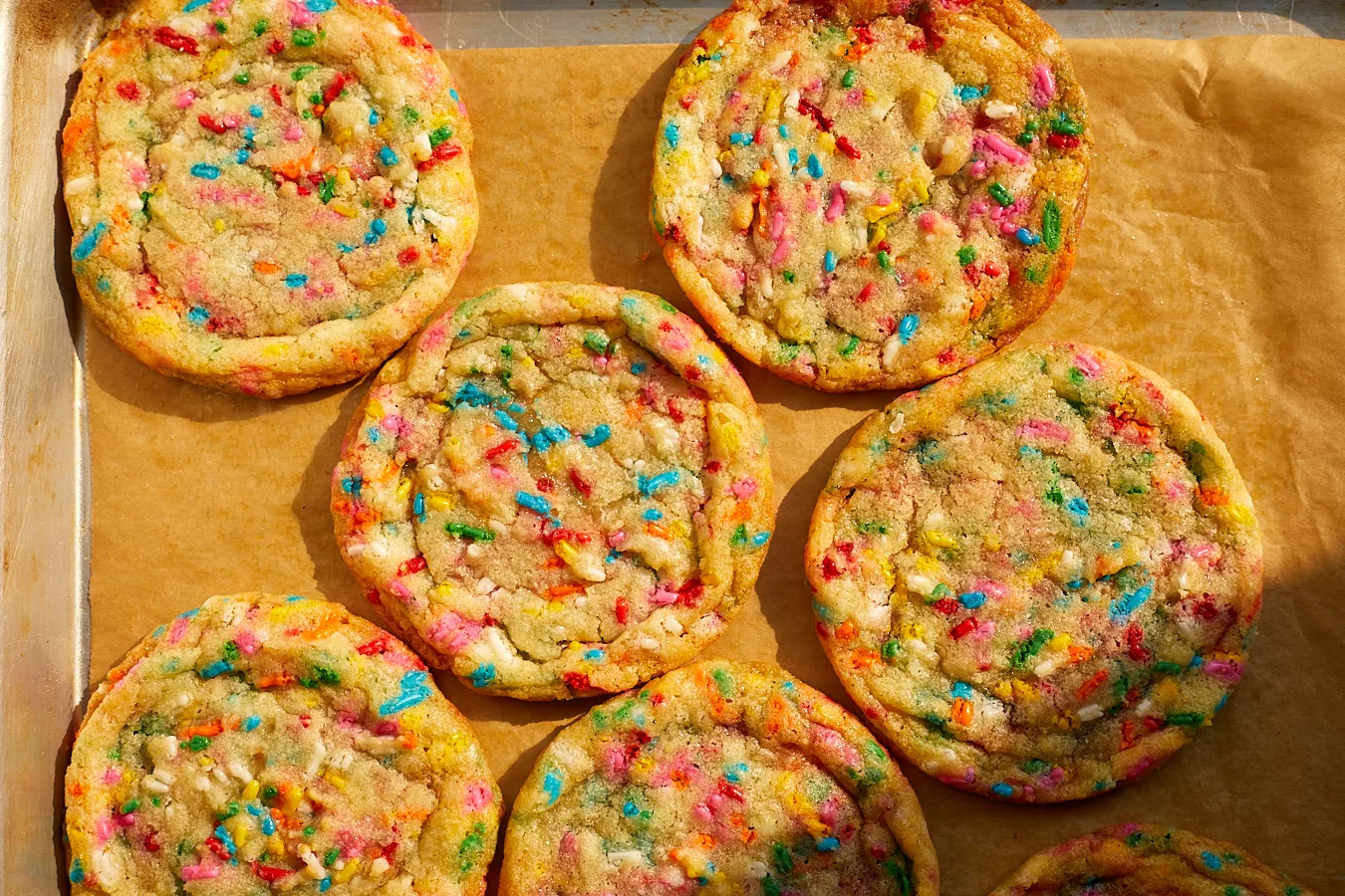 rainbow sprinkle confetti funfetti cookies on a tray