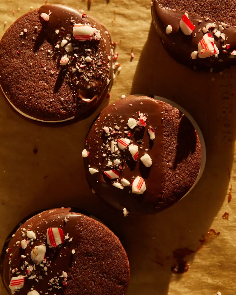 chocolate peppermint marshmallow sandwiches dipped in chocolate and sprinkled with crushed candy canes