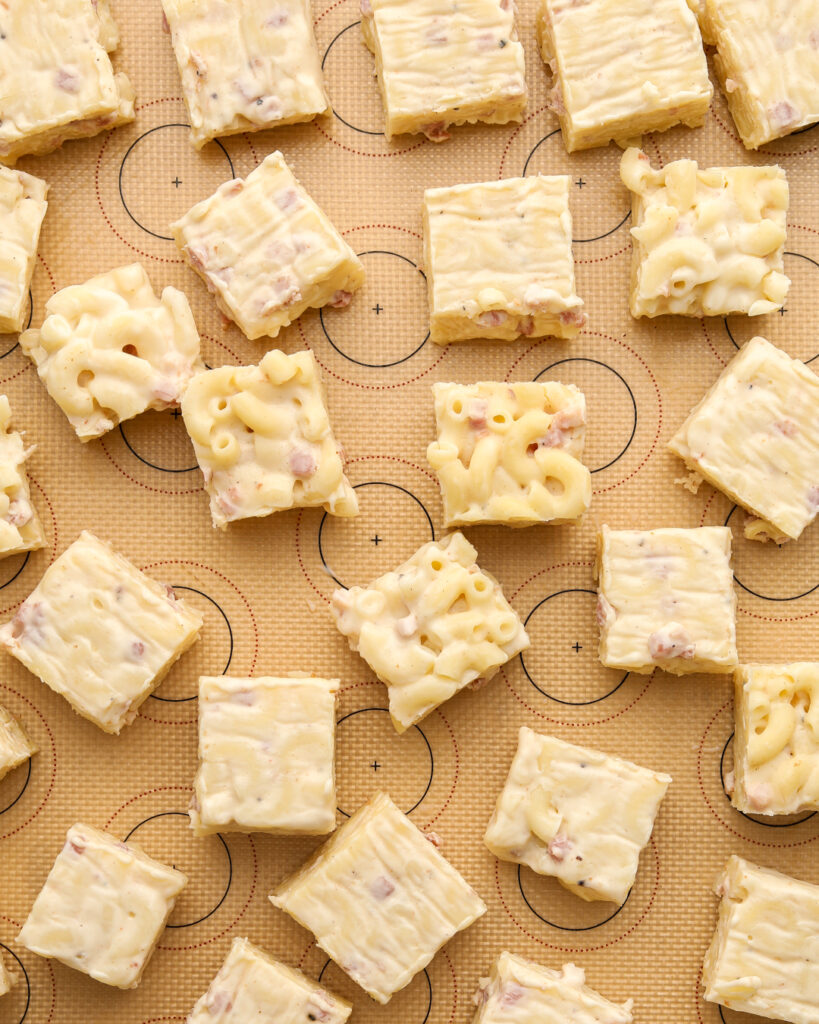 slicing up mac n cheese bites